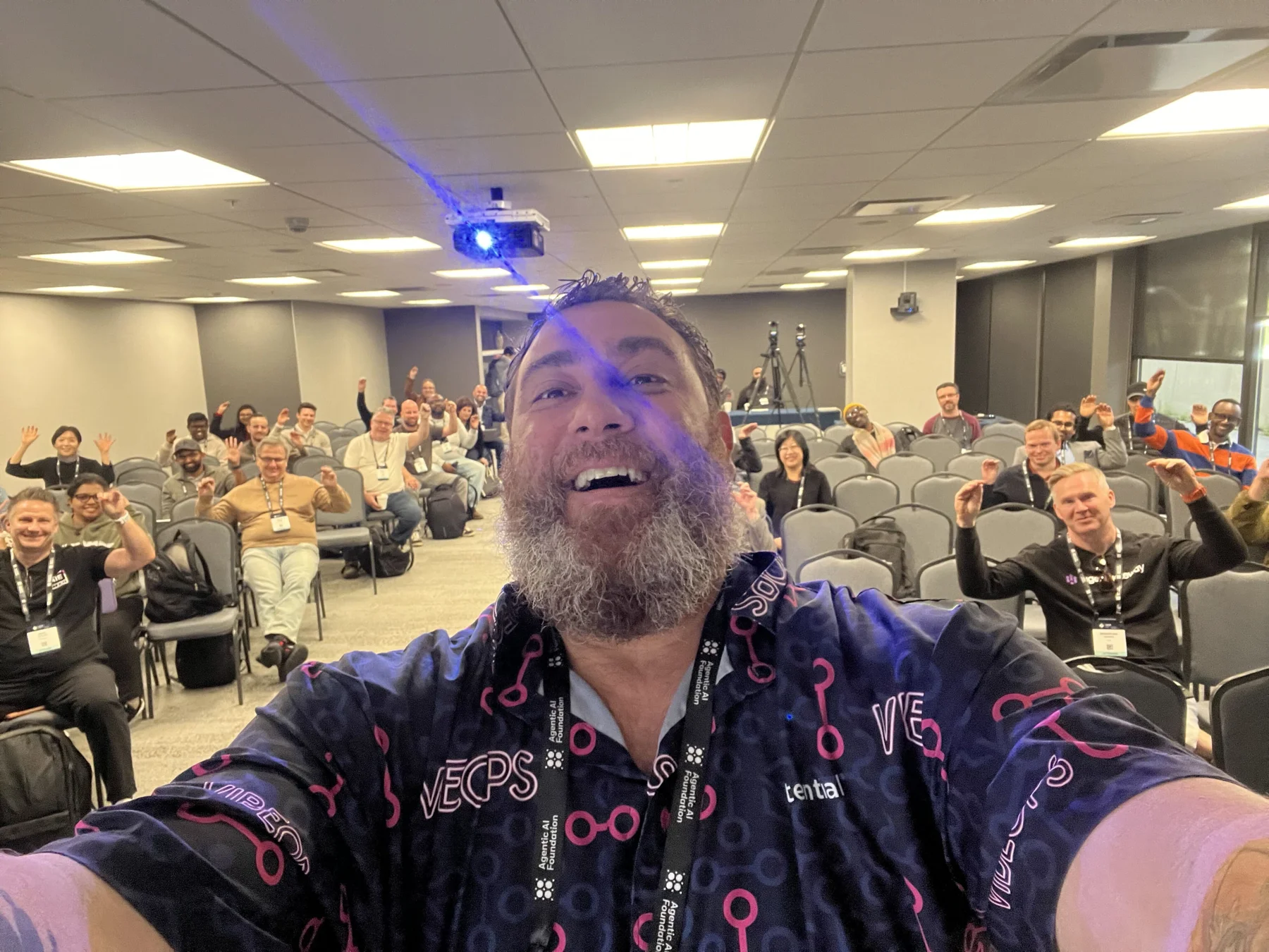 John taking a selfie with the Toronto session audience behind him